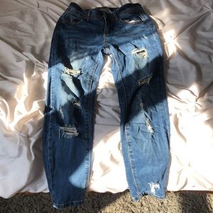 ripped wax jeans by fashion nova